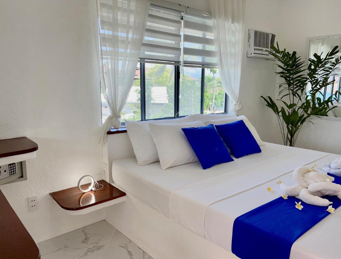 Pawikan Boutique Hotel Moalboal Bagian luar foto